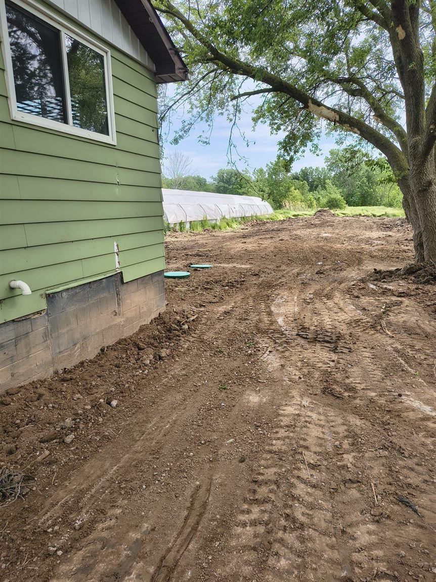 Septic area backfilled and final graded